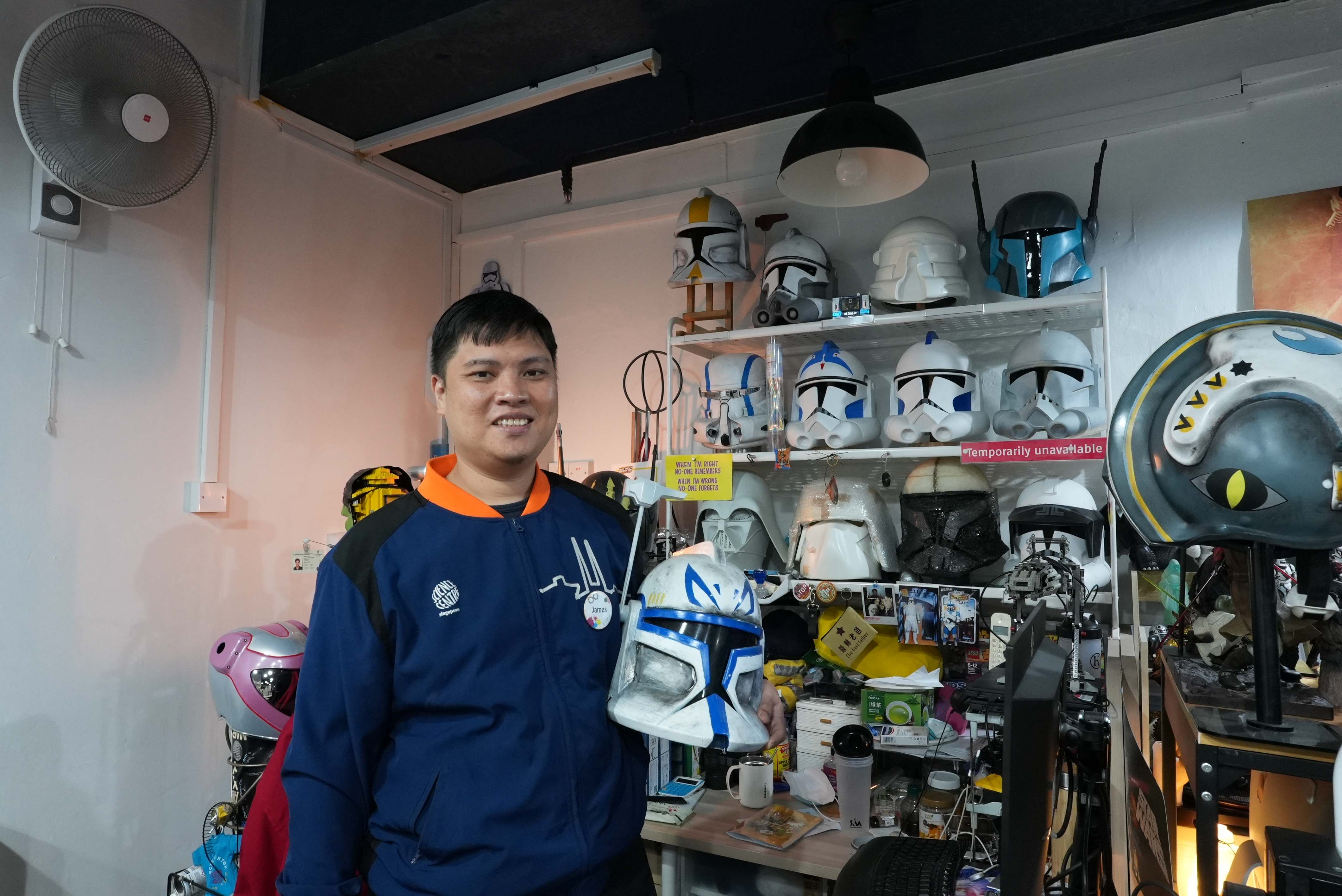 Master Science Educator James Emmann Lim with his Star Wars themed desk at Science Centre Singapore.